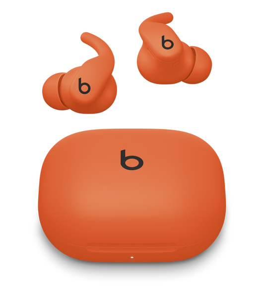 Powerbeats Fit wireless earbuds in Spark Orange floating above colour-matched charging case. 